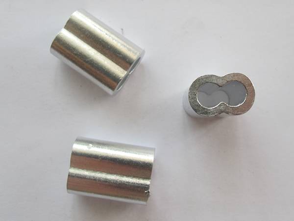 Two galvanized aluminum crimping loop sleeves on the white background.