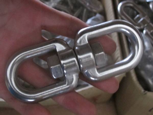 A turnbuckles for stainless steel rope in a hand.